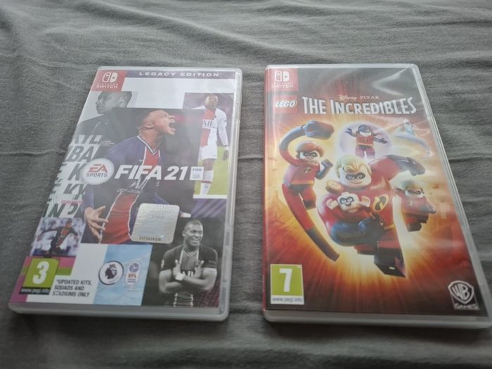 Nintendo Switch + 2 games + case