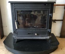 Stove and plinth