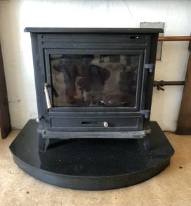 Stove and plinth