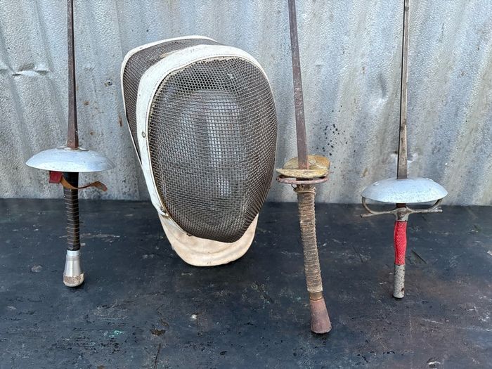 Vintage French Foils, Epee, Sabre and fencing mask. c1920