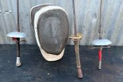 Vintage French Foils, Epee, Sabre and fencing mask. c1920