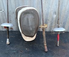 Vintage French Foils, Epee, Sabre and fencing mask. c1920
