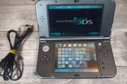 New Nintendo 3ds xl 128gb sd card hshop 1000s games for free VGC