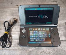 New Nintendo 3ds xl 128gb sd card hshop 1000s games for free VGC