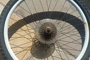 24" inch bike wheel with 7 speed cassette