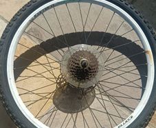 24" inch bike wheel with 7 speed cassette