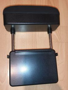 Additional car armrest.
