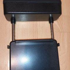 Additional car armrest.