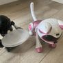 Robots cat and mouse and balancing with serving tray Image 10