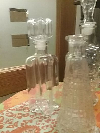 Four Glass Decanters with Stoppers