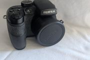 Fujifilm FinePix S1500 10.0-megapixel digital bridge camera in black