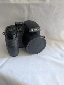 Fujifilm FinePix S1500 10.0-megapixel digital bridge camera in black