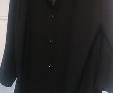 light jacket black dressy buttons one replacement button needs to be put on is inside  see photos  size 18