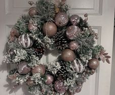Stunning pink snow flocked wreath