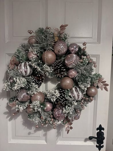 Stunning pink snow flocked wreath