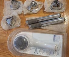 Assorted shower heads and shower holders