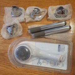 Assorted shower heads and shower holders