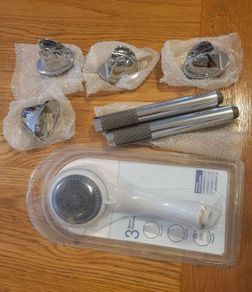 Assorted shower heads and shower holders