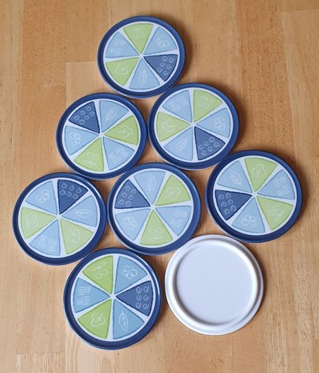 New - A Set of 8 Coasters - E