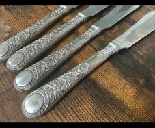 Set of vintage silver plated fish knives
