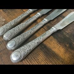 Set of vintage silver plated fish knives