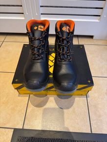 Steel toe safety boots.