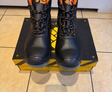Steel toe safety boots.