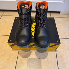 Steel toe safety boots.