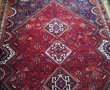 very large perasion rug