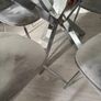 Glass dining table and 4 grey suede chairs Image 3