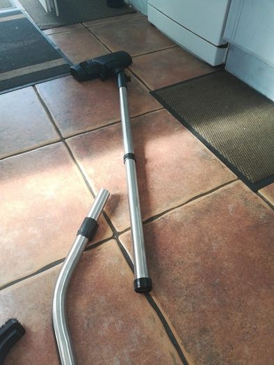Vacuum cleaner pipe and brush set.