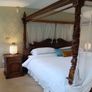Four poster carved Indonesian bed super king incl bedside tables and dresser Image 8