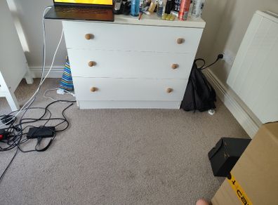 White 3-drawer chest with wooden knobs