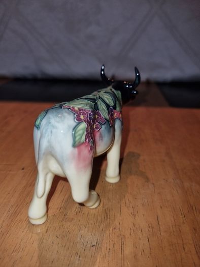 Porcelain colorful cow figurine