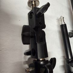 4 tripods with lighting mounts