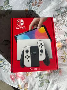 Nintendo Switch OLED White + 2 games
