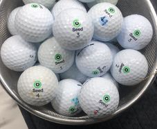 Basket of seed golf balls