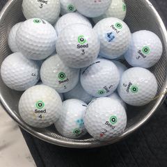 Basket of seed golf balls