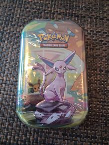 pokemon (tcg) prismatic evolutions tin