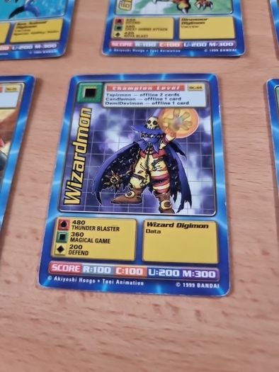 13 Champion level Digimon cards. 1999.
