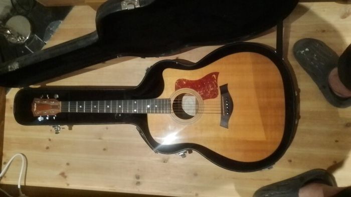 2003 Taylor 310-CE-L1. Limited edition. Koa back and sides. Includes OHSC.