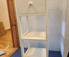 Compact shelving unit with drawer