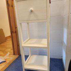 Compact shelving unit with drawer