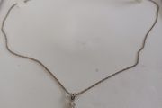 Silver cross and chain