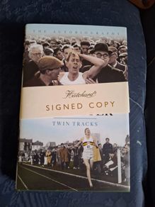 Signed first edition copy of the book Twin Tracks by Roger Bannister, the first man to run a sub four minute mile.