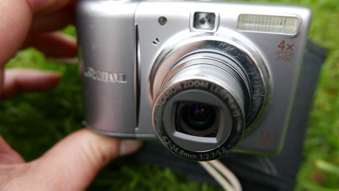 Canon PowerShot A1100 IS 12.1MP Digital Camera - Silver Tested Works well