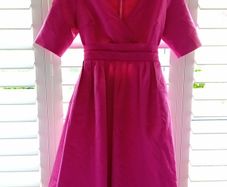 Designer made dress v neck off the shoulder.