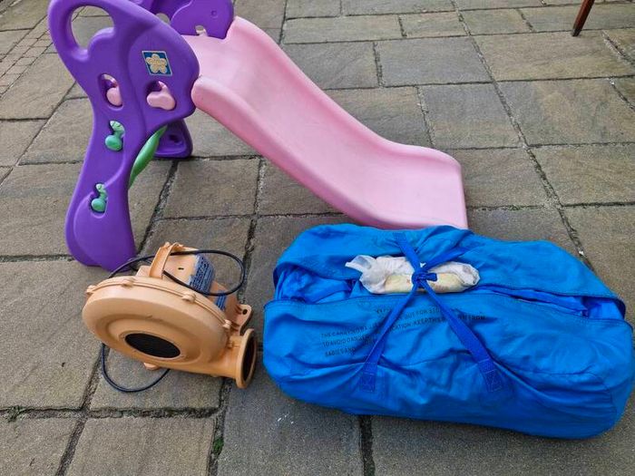 Bouncing castle blowers and childrens slide and bouncing castle slightly  stained and a few tiny hole thats easly fixed a bargain