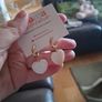 Gold hoop earrings with shell heart Image 2