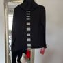 Naya black hooded top with white piping and design down back Image 4